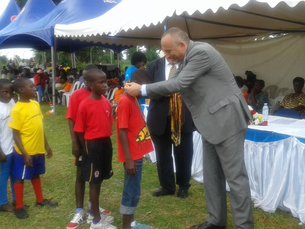 Sambannz's tweet photo. Giving out Medals to the Winners is The Italian Rep to Uganda.#TalentedAndAble @corsuhospital https://t.co/snM35VccX0