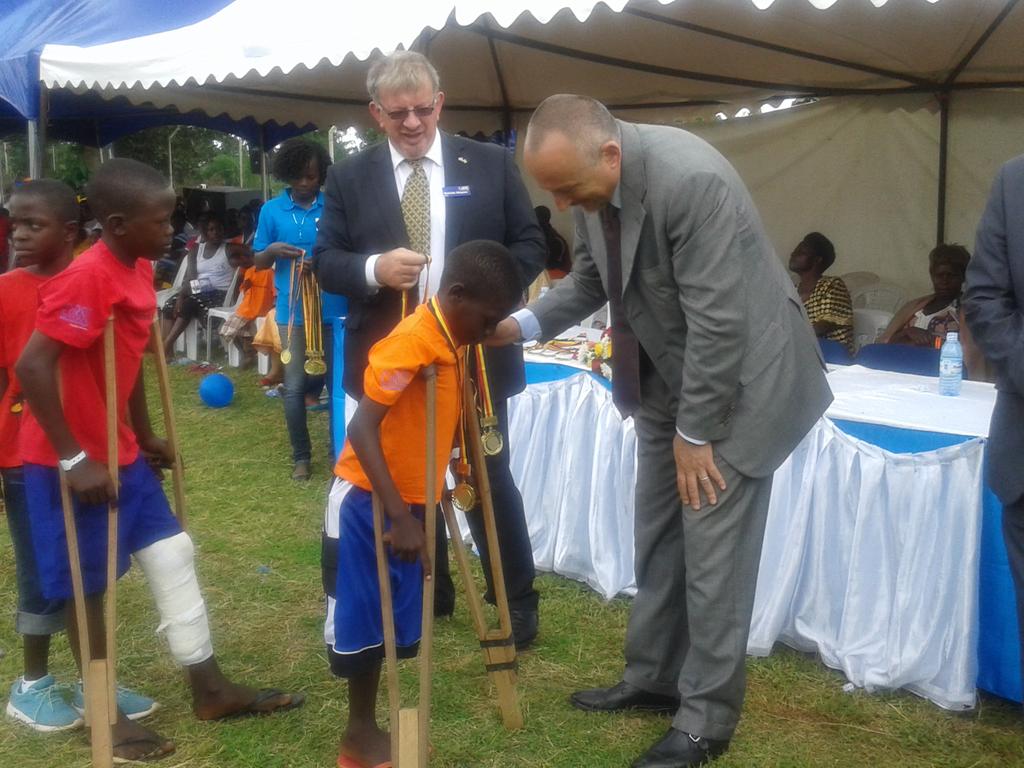 Sambannz's tweet photo. Giving out Medals to the Winners is The Italian Rep to Uganda.#TalentedAndAble @corsuhospital https://t.co/snM35VccX0