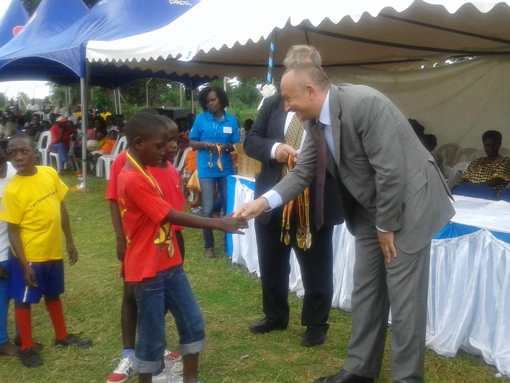 Sambannz's tweet photo. Giving out Medals to the Winners is The Italian Rep to Uganda.#TalentedAndAble @corsuhospital https://t.co/snM35VccX0