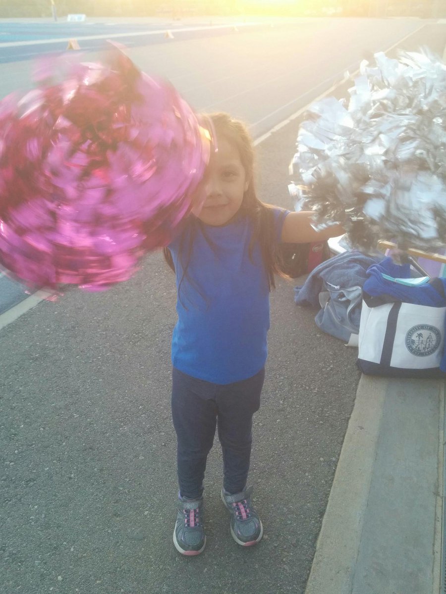 Olivia pretending to be a West Hills Wolfpack cheerleader 🎀 🐺 💙 #WHHSPack