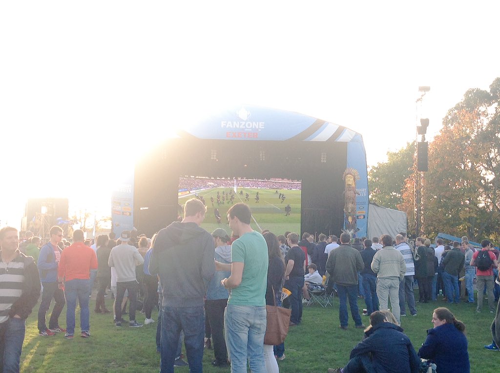 RWC2015Exeter's tweet photo. The #ExeterFanzone is filling up for #RWCFinal for #NZLAUS beautiful sunset behind the big screen #RWC2015 https://t.co/DU3U35pf4J