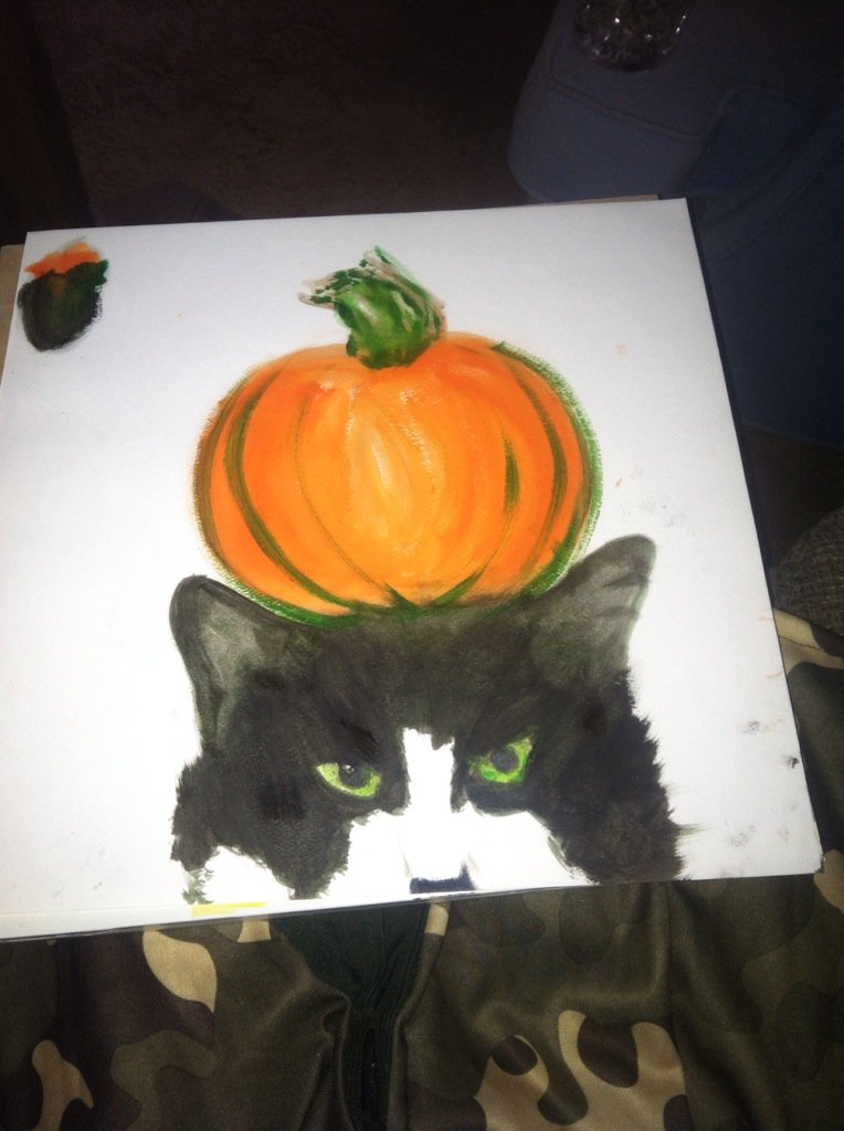 Johnelle_C's tweet photo. Happy Halloween here's a painting of my cat I did while consuming large gulps of wine. You're welcome. https://t.co/fRj0WHXqbY