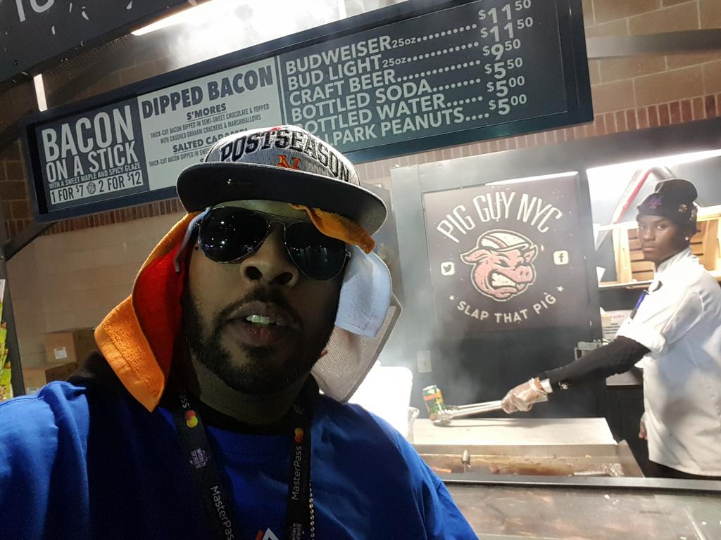 OfficialDJShug's tweet photo. Still the best food at the #mets #CitiField @PIGGUYNYC ! Tastes even better at the #WorldSeries ! #BaconOnAStick https://t.co/J9NaS9Itrc