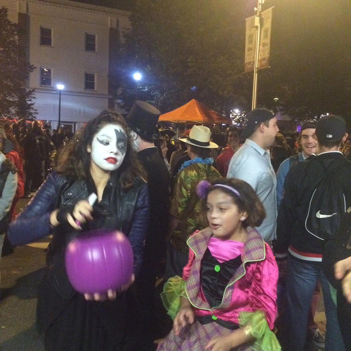 Good catch. Halloween candy tossed to kids on Essex Street in #salemhalloween