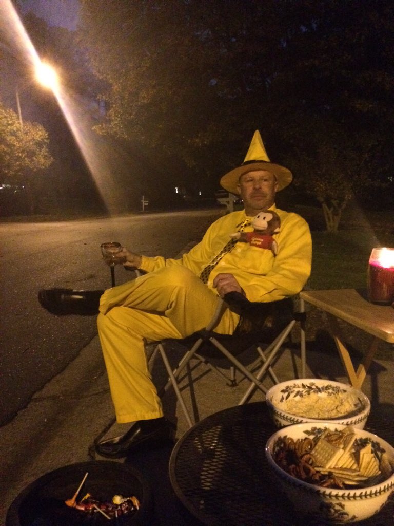 momovand's tweet photo. I don't think the man in the yellow hat is supposed to drink wine. #iamnotamonkey https://t.co/a5l3OOK78a