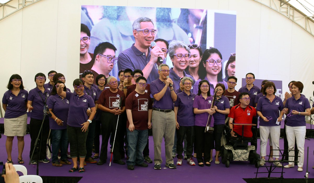 leehsienloong's tweet photo. A fun afternoon at the #PurpleParadeSg ytdy! Let’s build a more inclusive society. – LHL https://t.co/GIKigg5gQX https://t.co/srlsFjn7Us