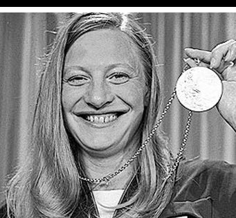 theodelaney's tweet photo. Ronald Koeman looks like Olympic legend Mary Peters. https://t.co/YnK7zoTtHw