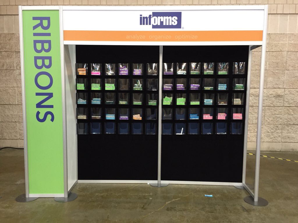 Springernomics's tweet image. The #INFORMS2015 Ribbon Wars just got real. How many are you wearing?