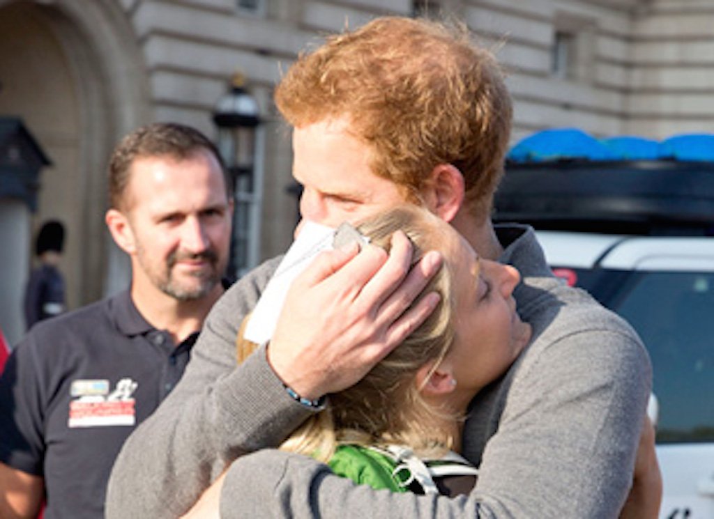 usweekly's tweet photo. Aww, Prince Harry. See how he got emotional after receiving dog tags from an injured marine: https://t.co/aNqZPIeYW1 https://t.co/tqVgjXBt4l