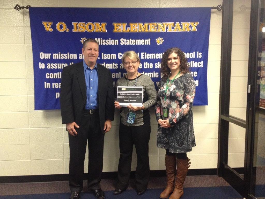 Mrs. Wooton, Isom principal surprised this morning by <a href="/gef_gw/">GW Edu. Foundation</a> board members Miller and Allen!Awarded Robotics grant!
