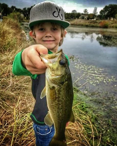 filthyanglers's tweet photo. #filthykid showing off his catch and new Filthy Flat brim from this weekend. Is your kid filthy? Use #filthykid https://t.co/Pz8JKx2sgP
