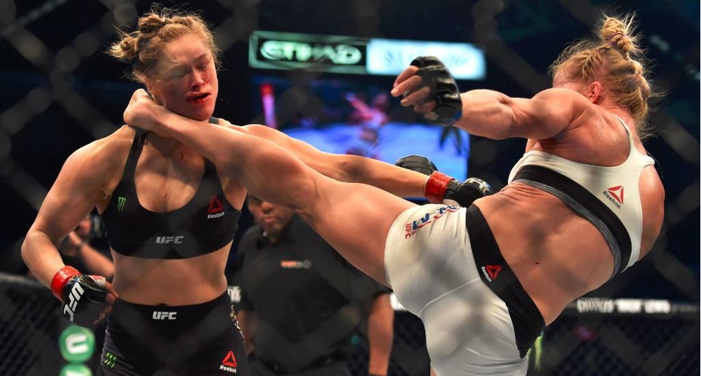 espn's tweet photo. The kick heard 'round the sports world.

More on a stunning #UFC193 here: https://t.co/Iwjl4aDYUw https://t.co/Vp6uuTlp8y