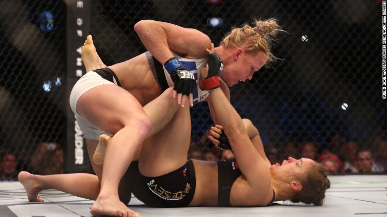 CNN's tweet photo. In possibly the biggest upset in @UFC history, @_HOLLYHOLM knocks out @RondaRousey https://t.co/067u8liZEQ #UFC193 https://t.co/rjGWgABkZn