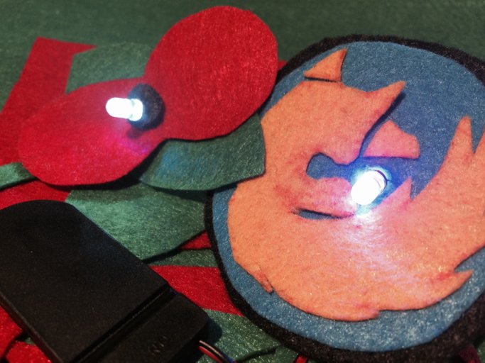 DorineFlies's tweet photo. #MozFest #youthZone 200+ flashing LEDS used to make Remembrance Sunday poppys &amp; fighting for the #openWeb fox badges https://t.co/1oLTszISr0