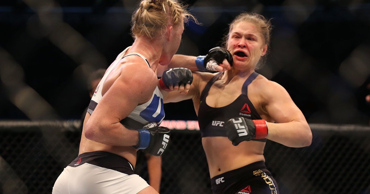 HuffPost's tweet photo. Ronda Rousey knocked out by Holly Holm in "unthinkable" UFC loss https://t.co/OSMNc1S60O https://t.co/0Efm2whIz4