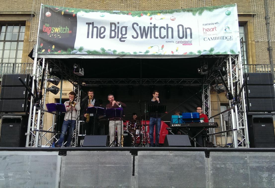 LoveCambridge_'s tweet photo. The #SwitchOn15 has begun in the Market Square! First up is Mode 9 from the @CamJazzFest! Come and listen to them! https://t.co/rq79Lvk4uN