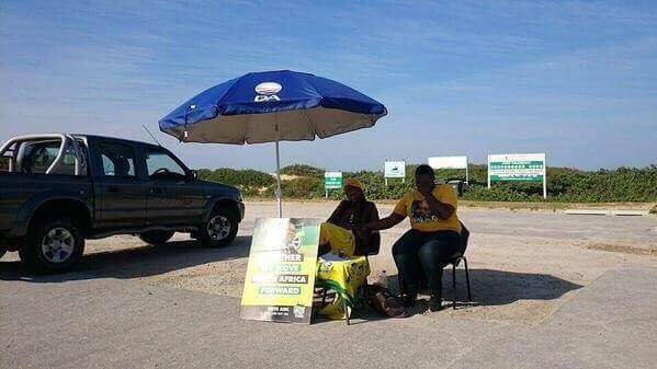 Wasn't sure why my friend sent me this picture...Then looked at who umbrella belongs to. I love South Africa!