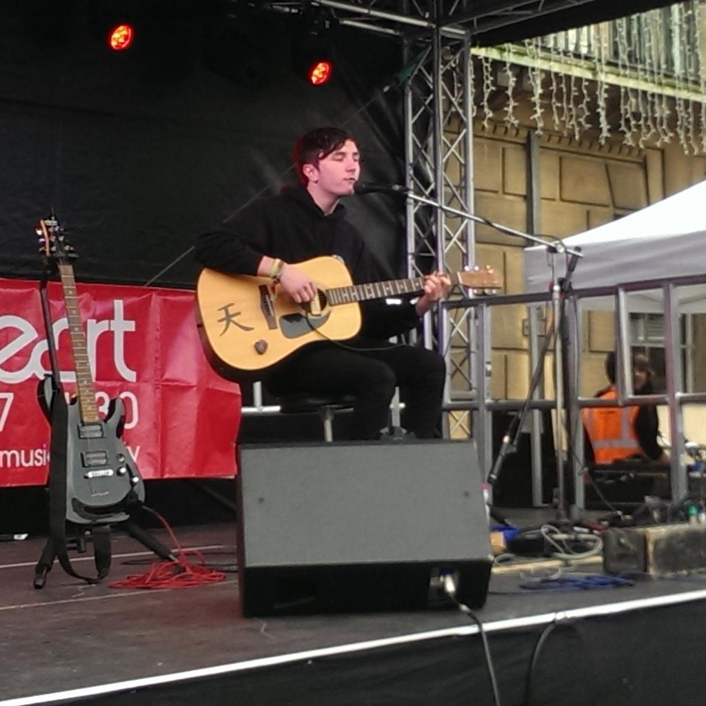 LoveCambridge_'s tweet photo. Here is @TomKorni perfoming some classics on stage in the Market Square right now! #SwitchOn15 https://t.co/r2D79iBINC