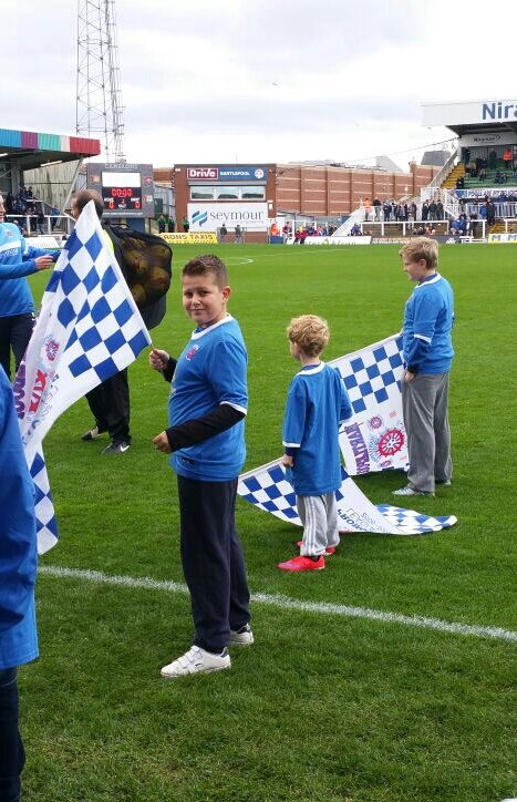cookiemc11's tweet photo. @1jeffstelling @GaryBarlow @hartlepoolutd my son Ben chosen to be flag bearer for today's match #proudtobeapoolie https://t.co/0oZiOkh7xn