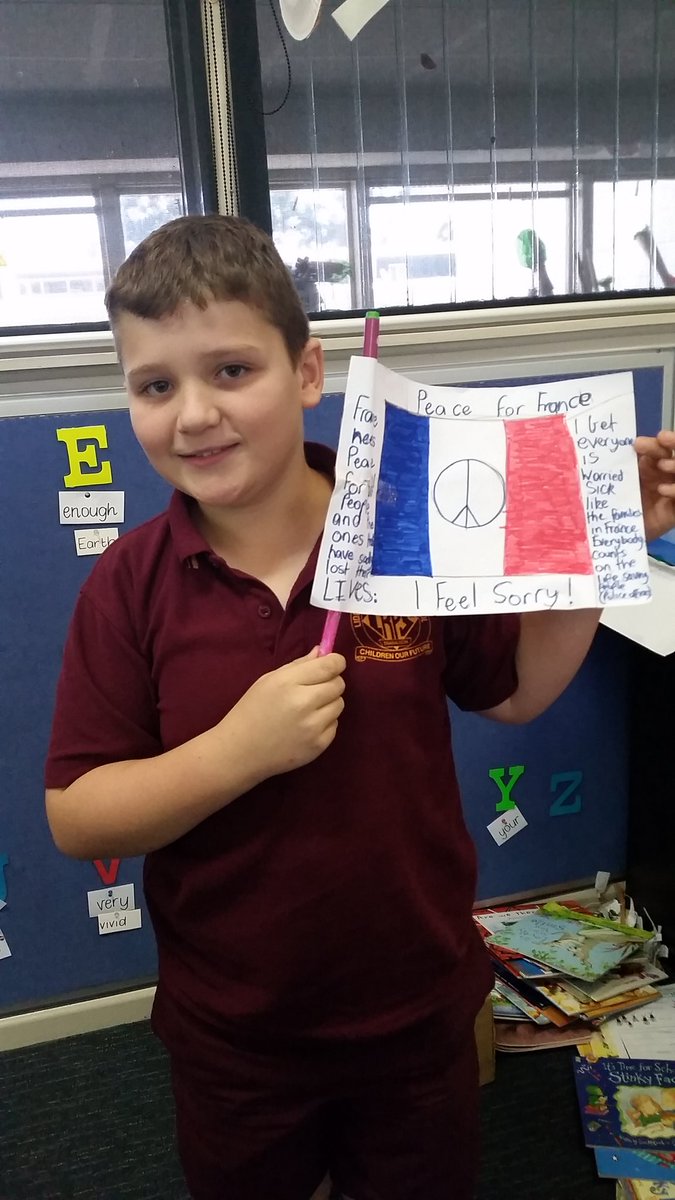 10 year old Ethan arrived at school with a flag he'd made at home. So proud of him #PrayForTheWorld #PrayForParis