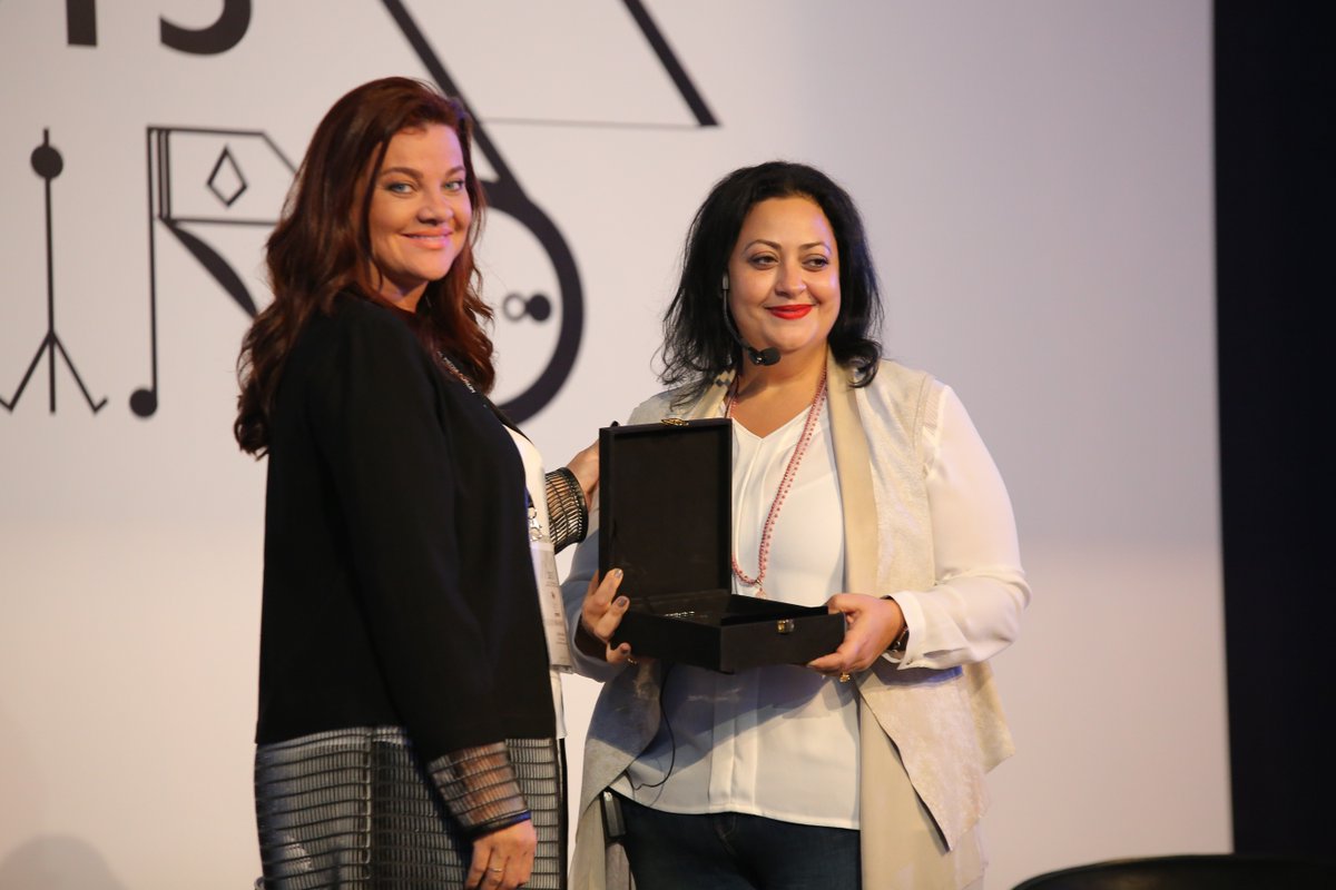 MDA2022_2023's tweet photo. @najla1966  awarded @rania_hafez  for a great career that effectively shaped and transformed many clients #DMFCairo https://t.co/Vyr96Er4EO