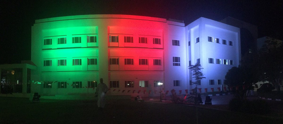 MEC_Oman's tweet photo. Middle East College lights up in Omani colors to celebrate Oman's #45th_National_Day https://t.co/pdbsL4dvKi
