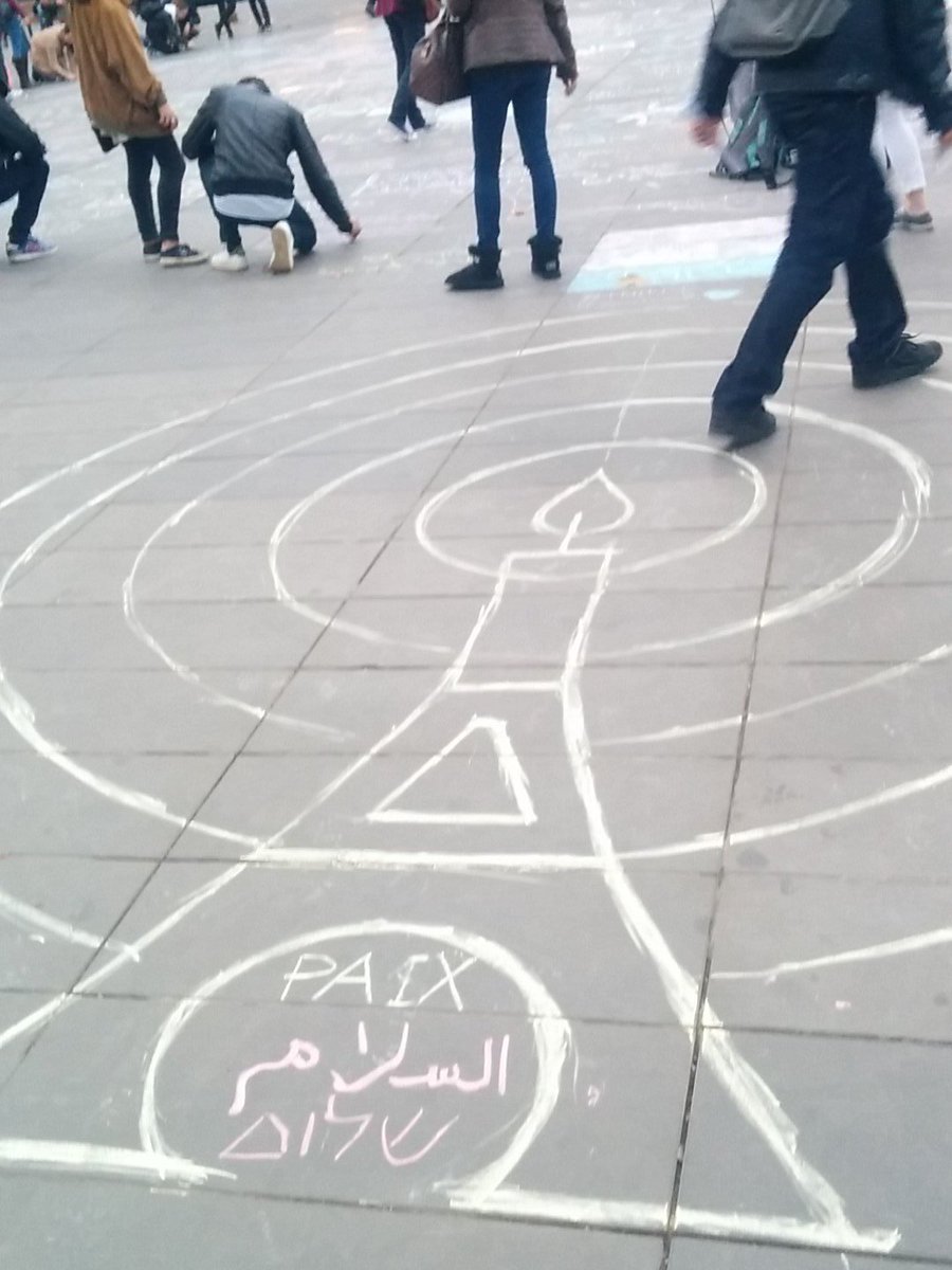 ZvikaKlein's tweet photo. The artist asked me to write peace in #hebew so I did #ParisAttacks #parisisburning https://t.co/I2BbThohqa