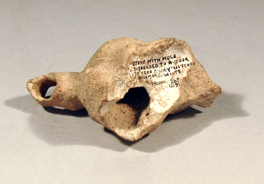 Pitt_Rivers's tweet photo. A Dorset 'hag stone' to keep away witches, collected by Gen. Pitt Rivers 1880-81 https://t.co/KlGp8ZhpnO #folklore https://t.co/QT7G6NgPXJ