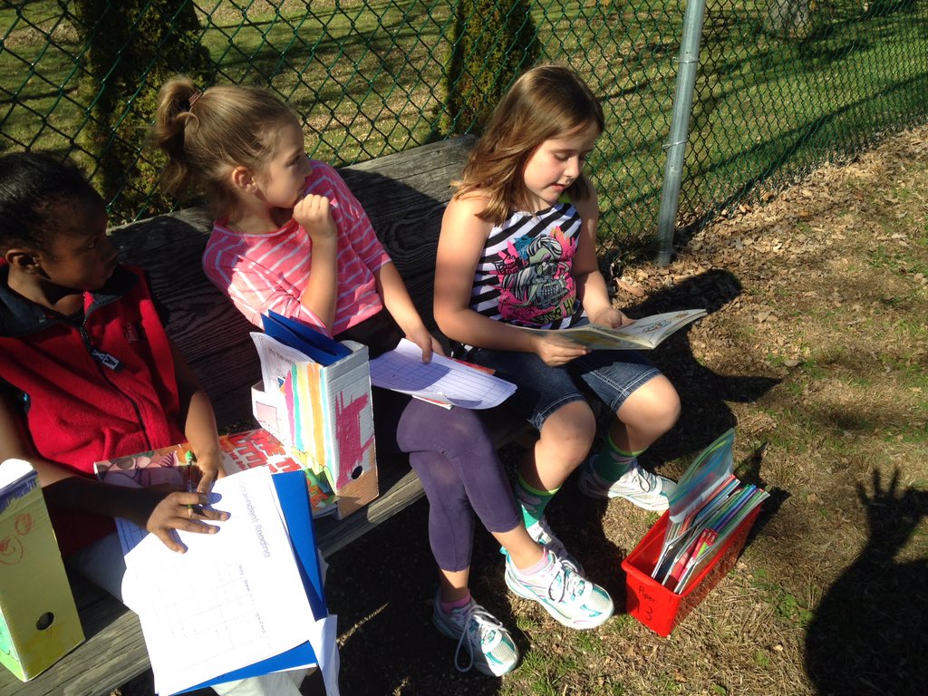 JES_Huskies's tweet photo. Mrs. Misinec's pups enjoying Indian Summer while reading outside! #pupsread https://t.co/g0Z9YDMCwW