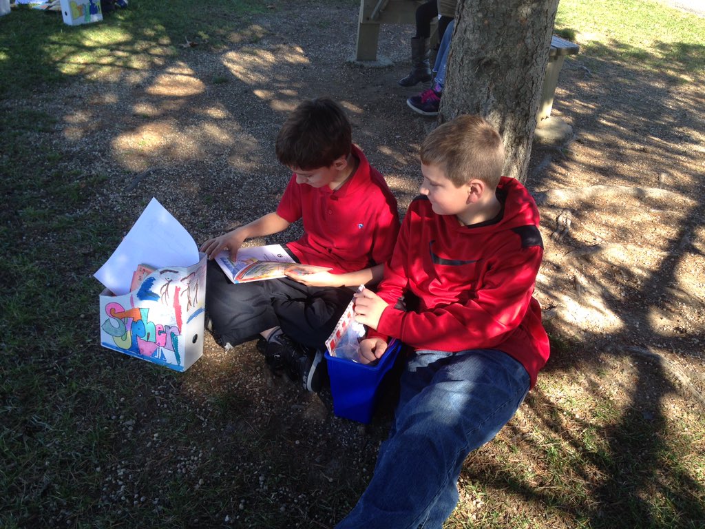 JES_Huskies's tweet photo. Mrs. Misinec's pups enjoying Indian Summer while reading outside! #pupsread https://t.co/g0Z9YDMCwW