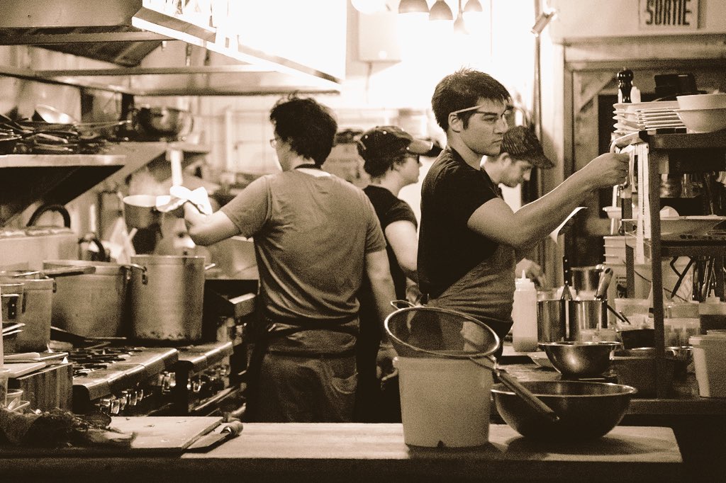 Hard at work <a href="/lasalleamanger/">La Salle à Manger</a> cooking Montreal style!