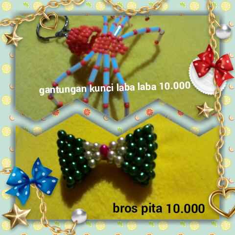 Gantungan kunci laba2 atau bros pita??