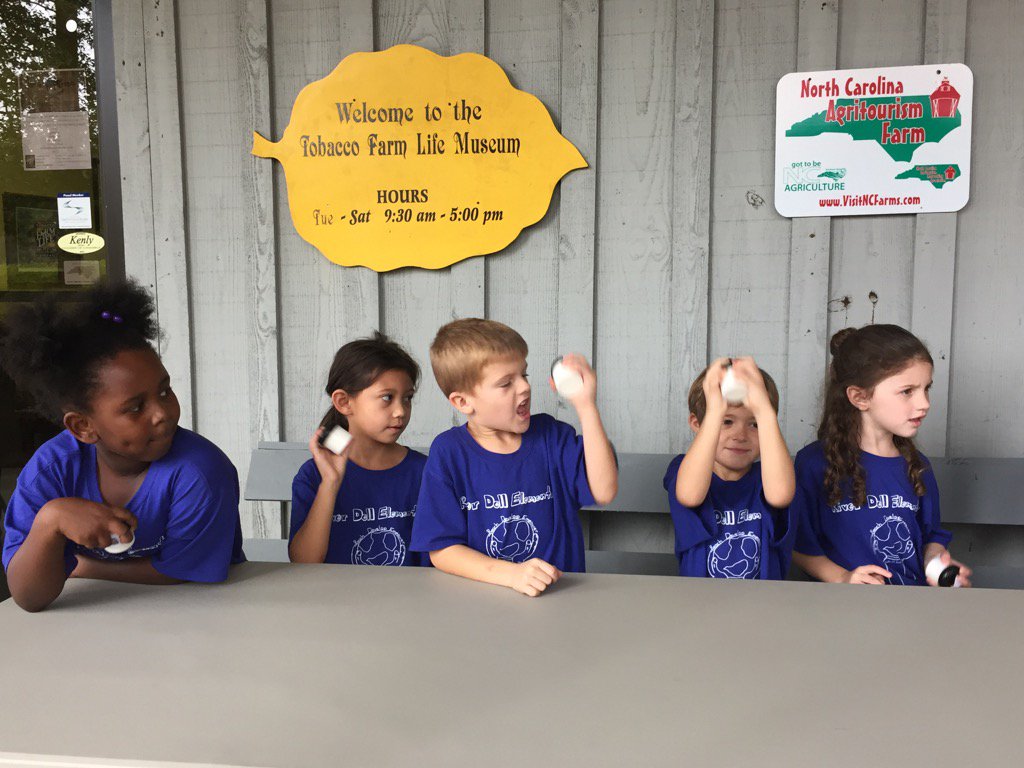 RDE first graders making butter at the Kenly Tobacco Farm Life Museum