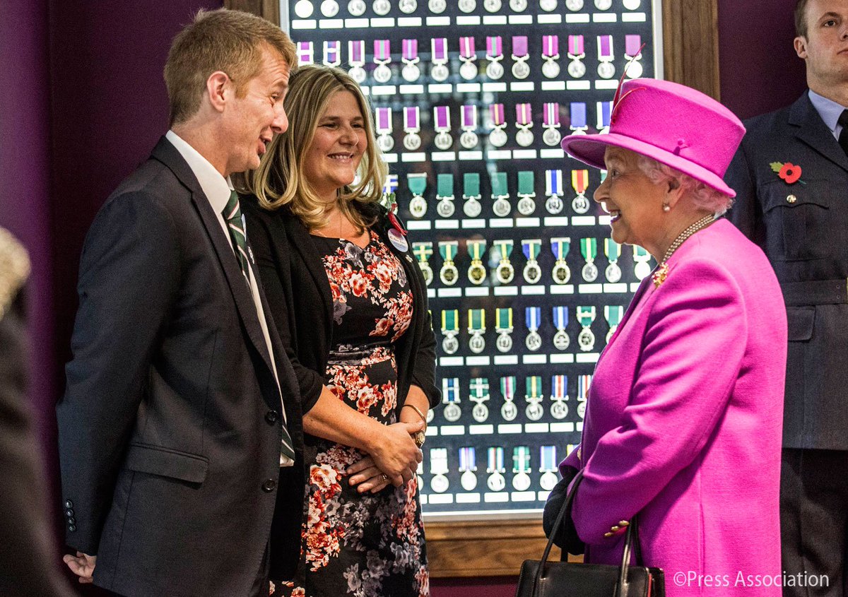 RoyalFamily's tweet photo. HM meets #ElizabethCross recipients Sharon and Efrem Brynin. Their son was killed in action in Afghanistan in 2013. https://t.co/6J04WApI0s