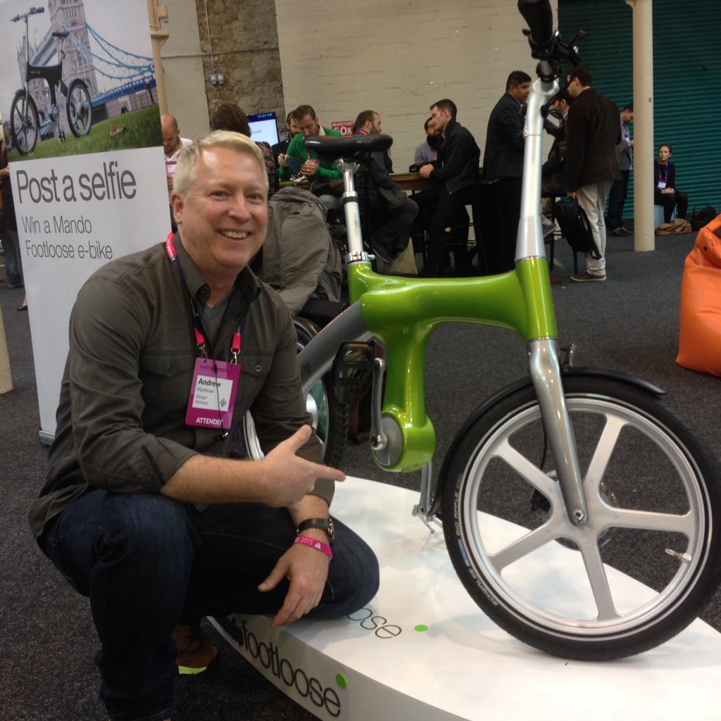 #mandowebsummit15 affordable, smart E-bike. Pedals generate power and control speed. Looks great too.