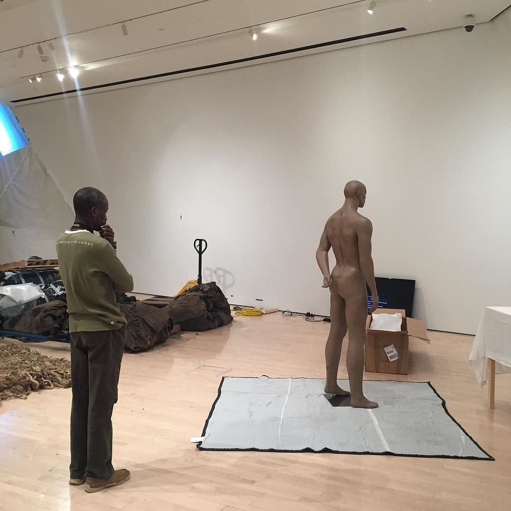 MSUBroad's tweet photo. @yesomi_umolu: #jeliliatiku pondering his installation #materialeffects #broadmsu https://t.co/xIZ1UFs530 https://t.co/KQSj3ze4uK