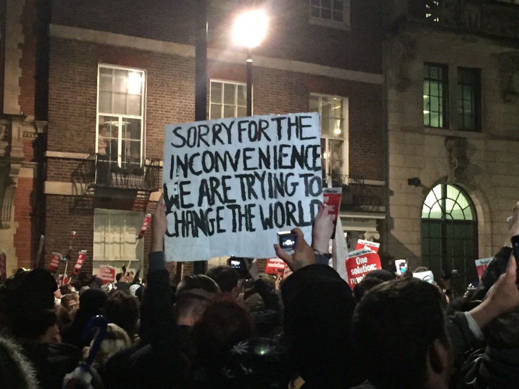 ProfKatyShaw's tweet photo. A Very British Banner on the #London #MillionMaskMarch - one of 650 cities tonight #marchsafe https://t.co/5Qyk92RFti