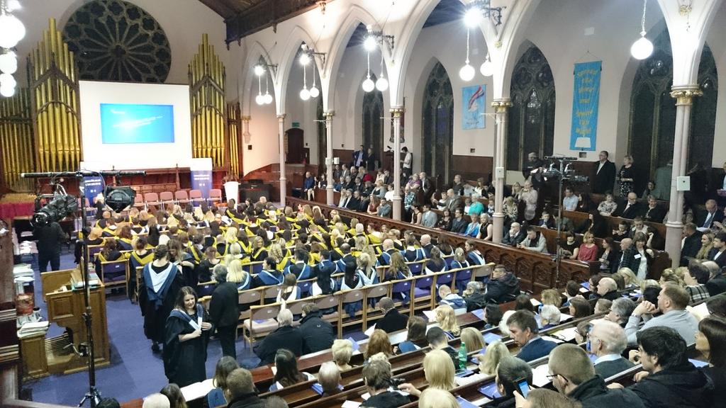 fifecollege's tweet photo. We're almost underway for our third ceremony of Graduation Week! #Grad15 https://t.co/UQO5uLyAaz