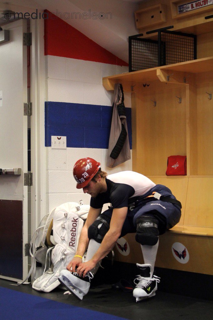 mediachameleon's tweet photo. 11/5/2010 Goalie Braden Holtby in the #washcaps locker room, wearing the team hard hat after his first NHL game #TBT https://t.co/YPjpvYnfcc