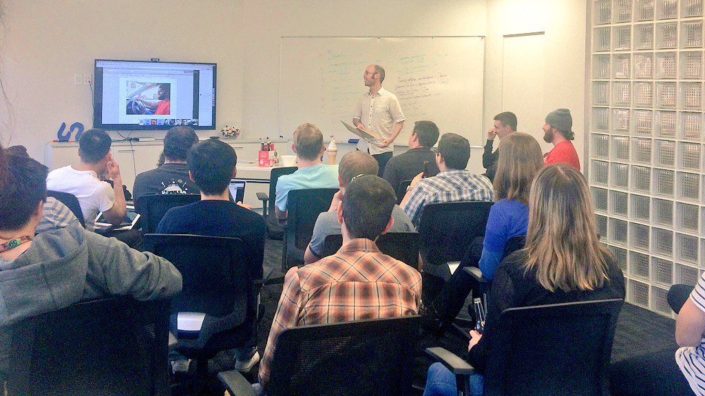 silverstripe's tweet photo. It's demo time at the #silverstripehackday - hearing about @sigurdmagnusson's future wagon (electric car) https://t.co/eaiNSIgejq
