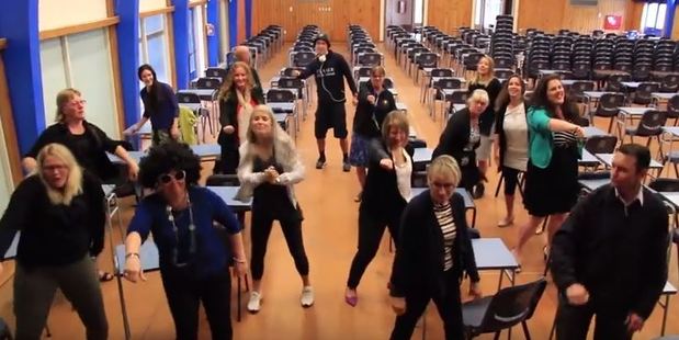 nzherald's tweet photo. Hamilton's Fraser High School teachers get their boogie on to wish students well on exams https://t.co/03eoD5zNhy https://t.co/mVOpOaHQkv