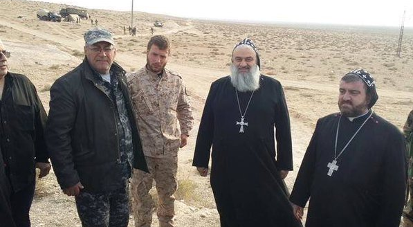 2ndNewMoon's tweet photo. Patriarch of #Syriac Orthodox Church Ignatius #Aphrem II with #Syrian armed forces. https://t.co/GpLeQztd4I