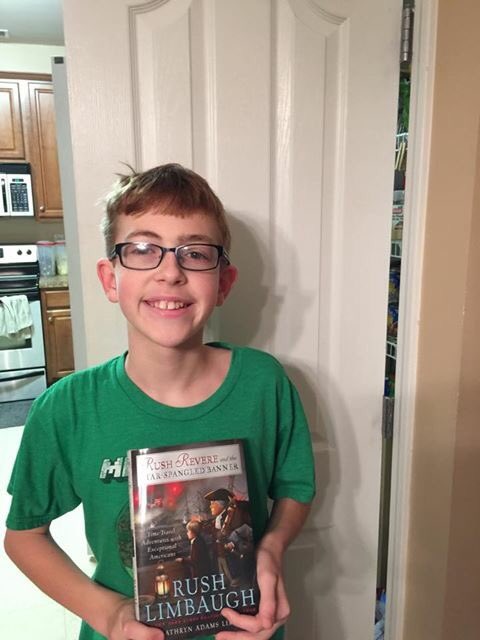 LauraCourtney's tweet photo. @rushrevere my happy grandson AJ &amp; his new book! https://t.co/Uo9DGBaNPH