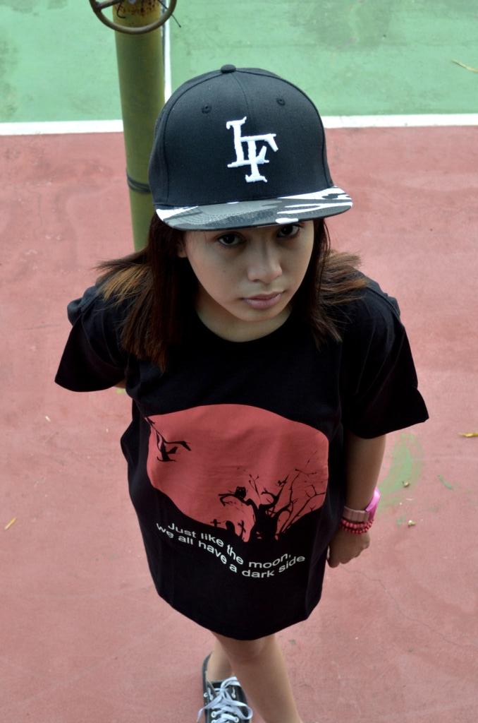 She's wearing snapback "shadow camouLFage" IDR 100K &amp; tees "dark side of the moon" IDR 100K.
#LSTFGR