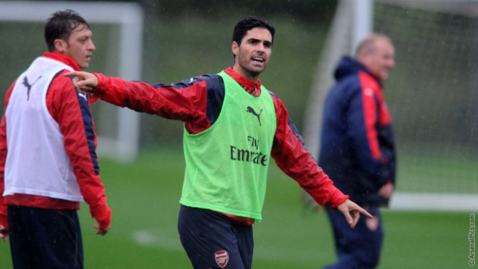 Arsenal's tweet photo. PICTURES: Go behind the scenes at @Arsenal's training session ahead of #AFCvTHFC: https://t.co/Jnarr4Vzny https://t.co/Rg4bZLrxqj