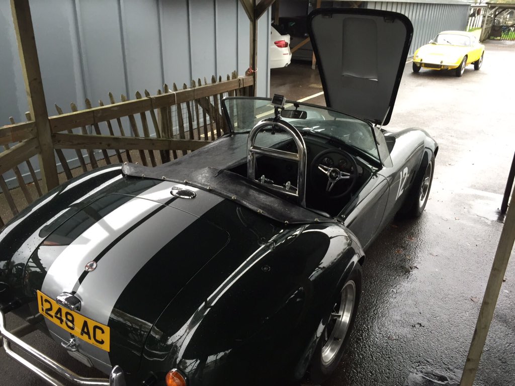 The laps continue at #Goodwood #ACOwners sprint despite the rain. Redline #accobra taking a breather