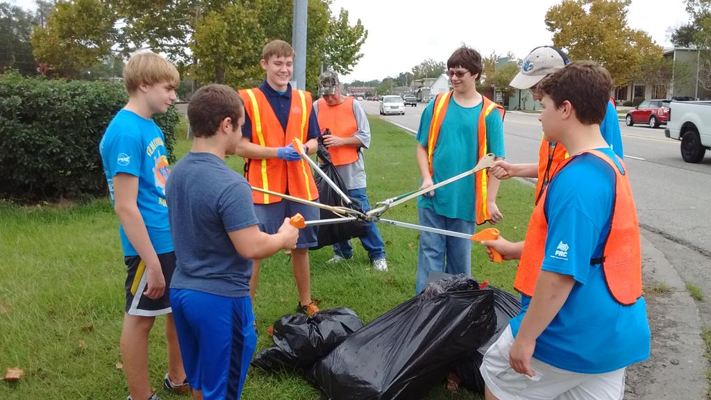 Our <a href="/FTCTeams/">FIRST Tech Challenge</a> students, done with a rainy day outreach clearing litter with <a href="/CityofSlidell/">City of Slidell, LA</a>.  And ready for pizza.