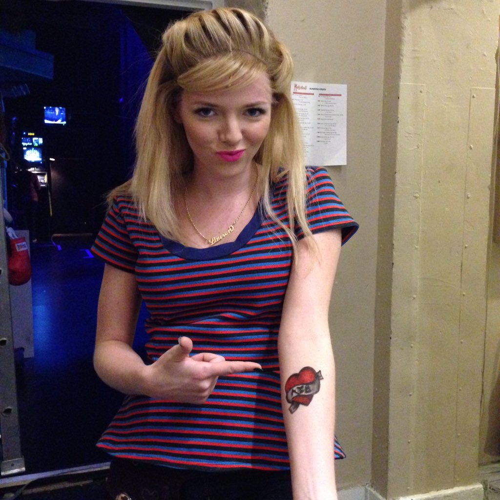 <a href="/AJBridel/">AJ Bridel</a> playing Lauren here in #KinkyBootsTO showing off her tattoo!! Who do you think that was done for?