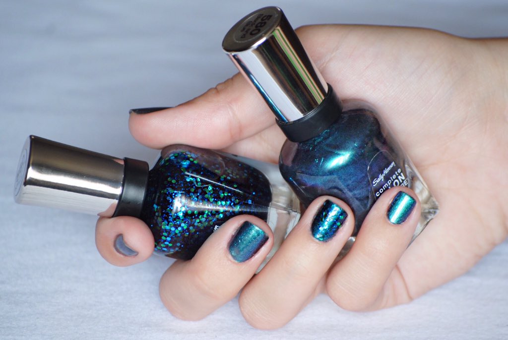 APolishedArt's tweet photo. Mermaids tale and black and blue by Sally Hansen https://t.co/R2lNZfKtMa