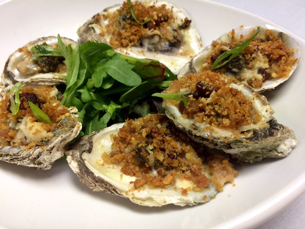Blue_H2OGrill's tweet photo. Broiled Ship John oysters topped with basil pesto, house-smoked bacon, Parmesan cheese, and garlic bread crumbs! https://t.co/gloviYPI2S